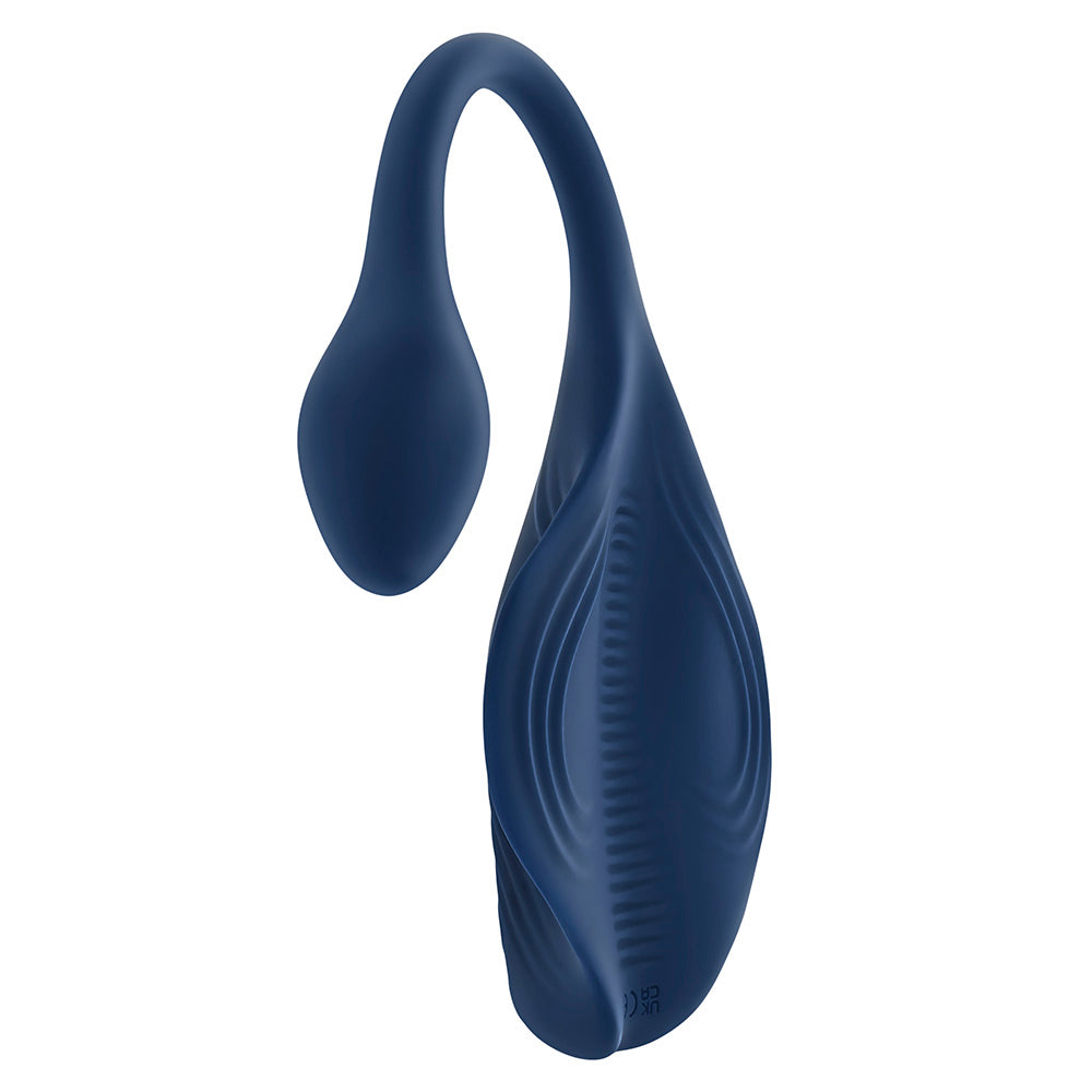 A dark blue, curved silicone toy with a textured, leaf-like shape.