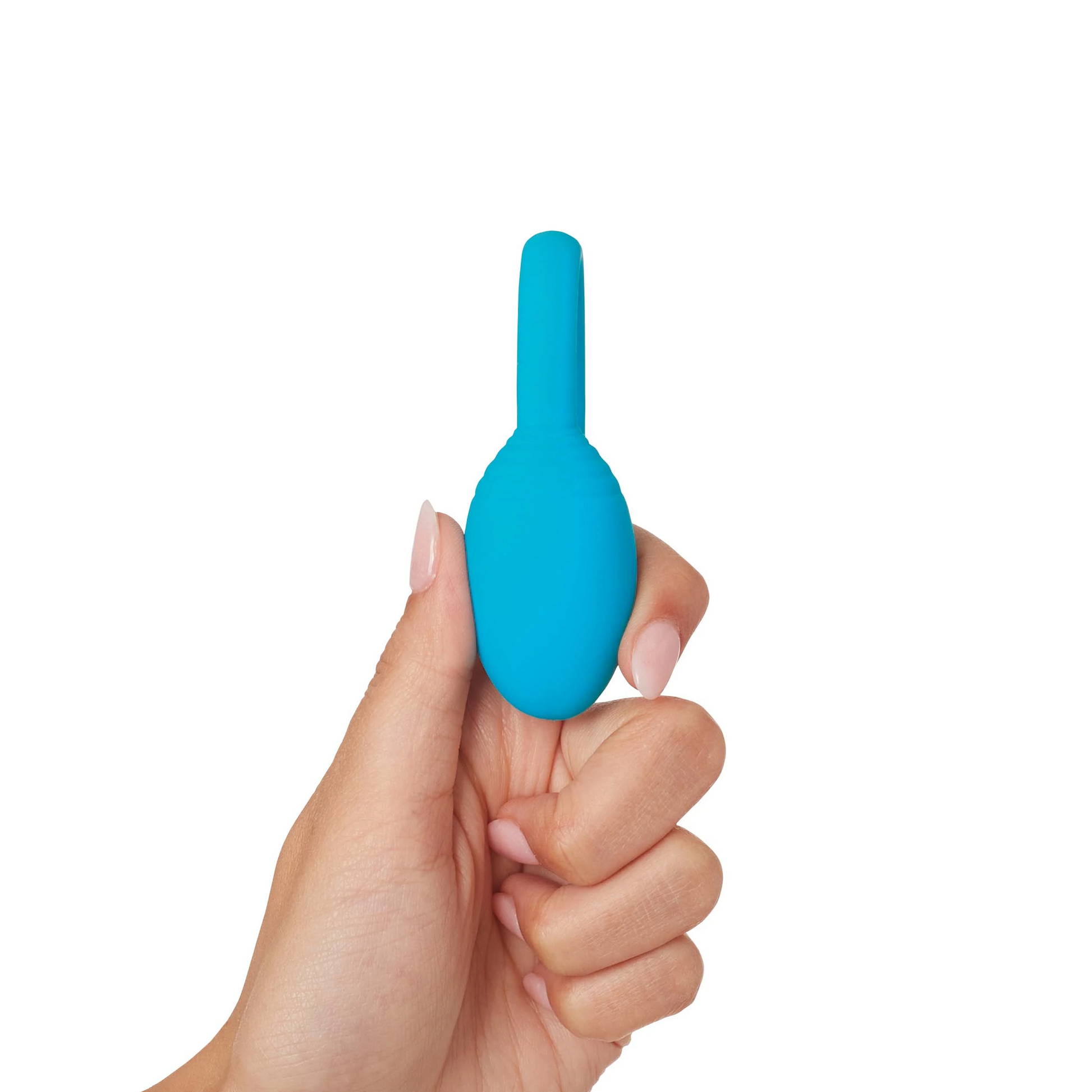 A hand holds a blue kegel trainer.