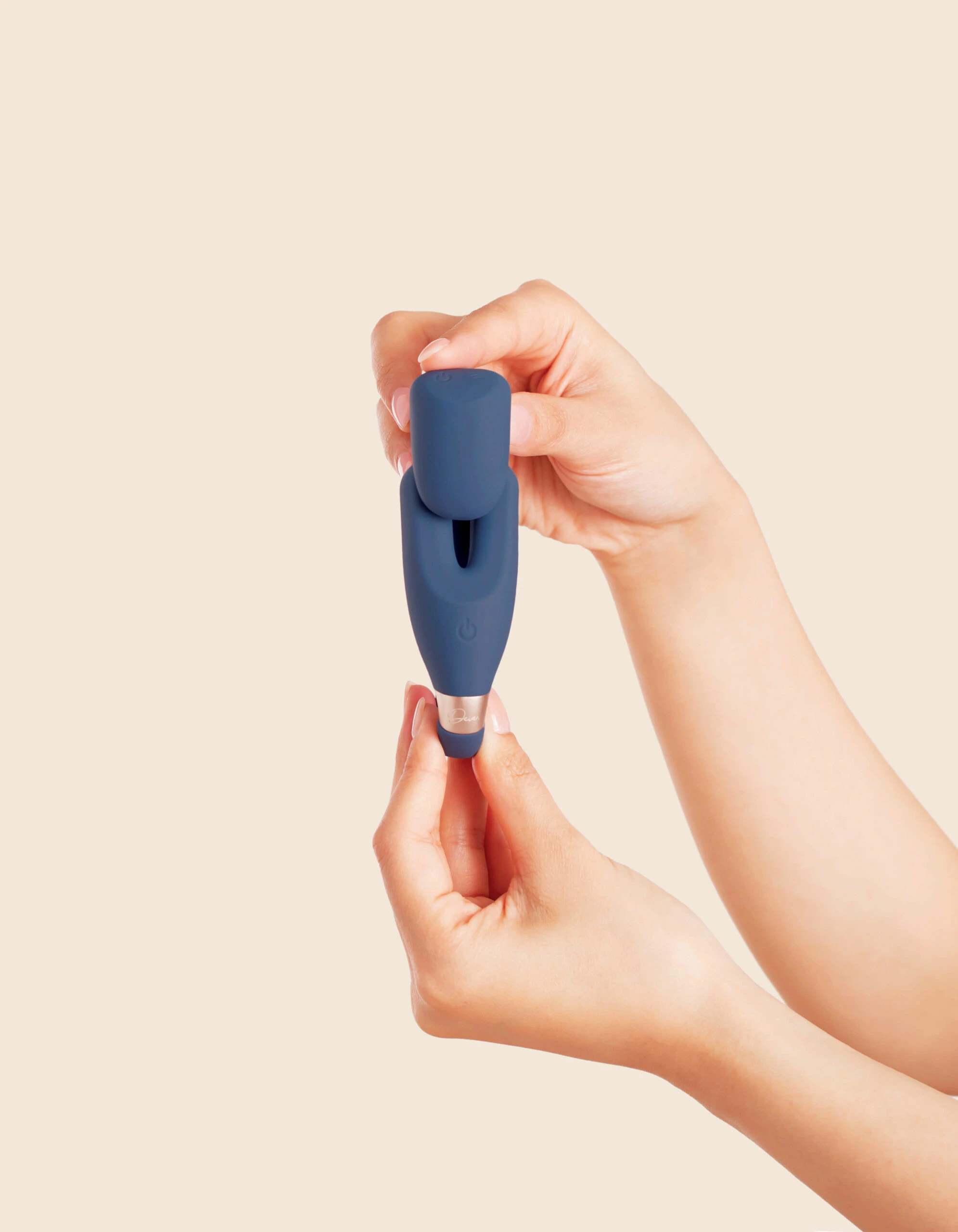 A blue wearable remote control vibrator with a charging case.