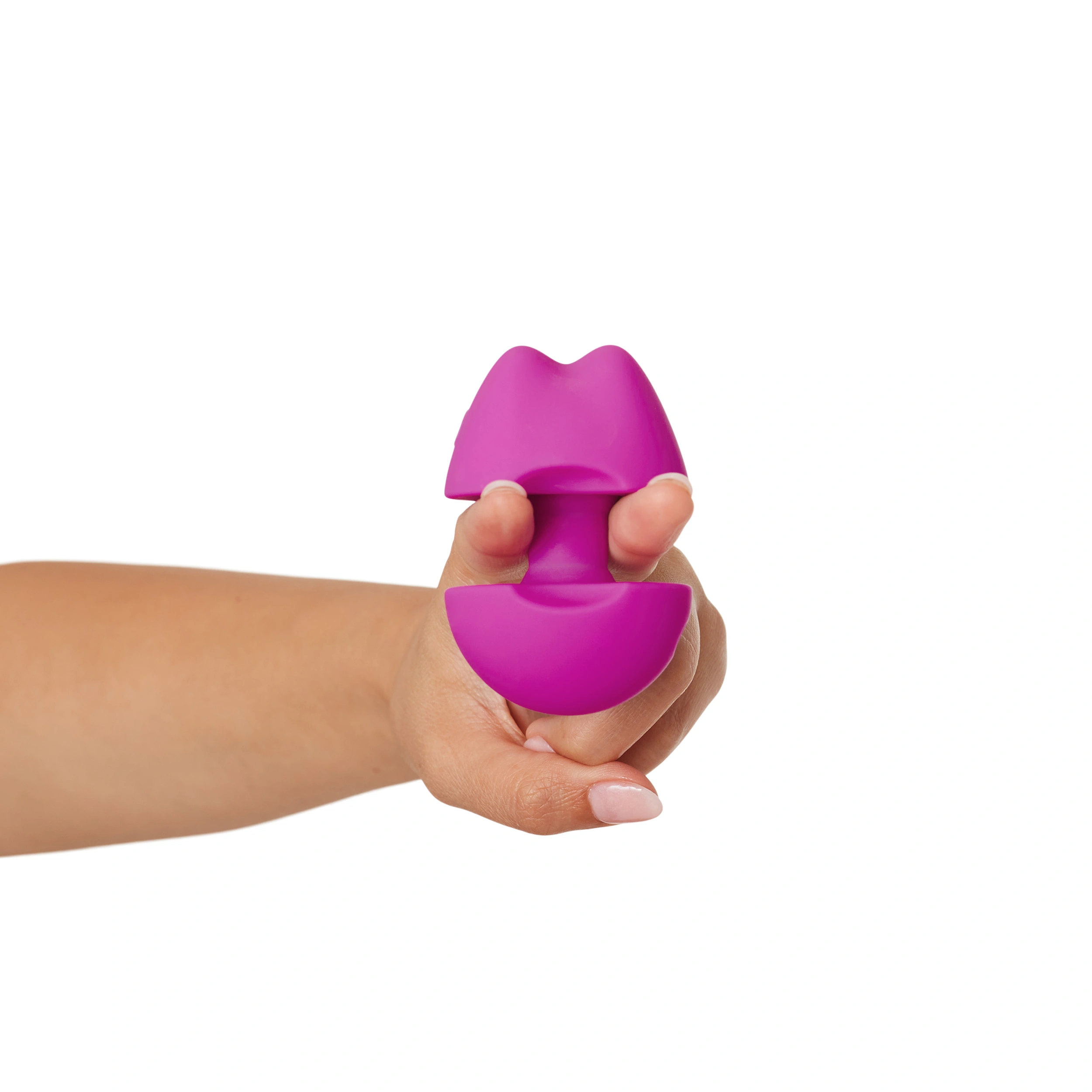 A hand holds a purple, lip-shaped vibrator.