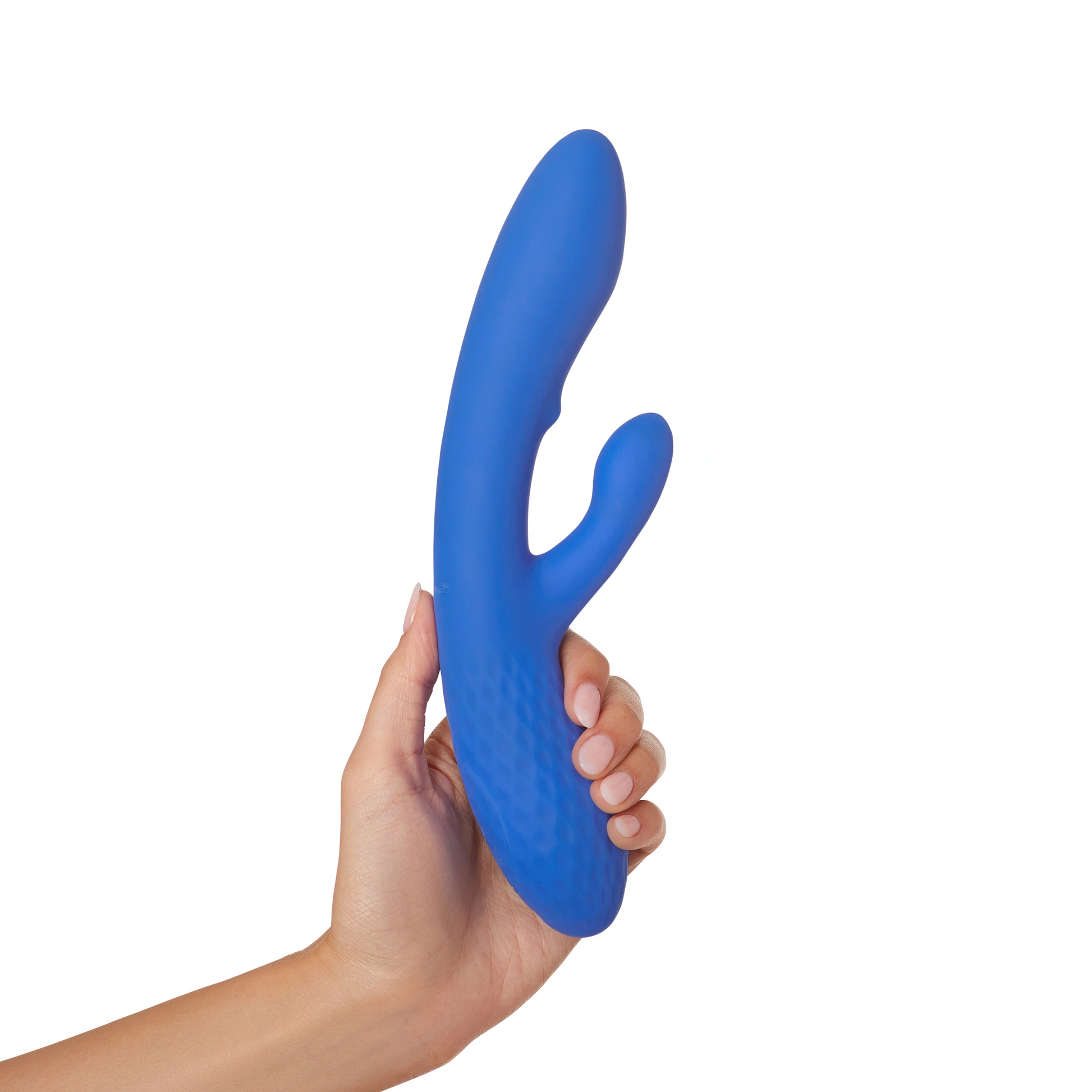 A blue dual G-spot massager with a stroking bead held in a hand.