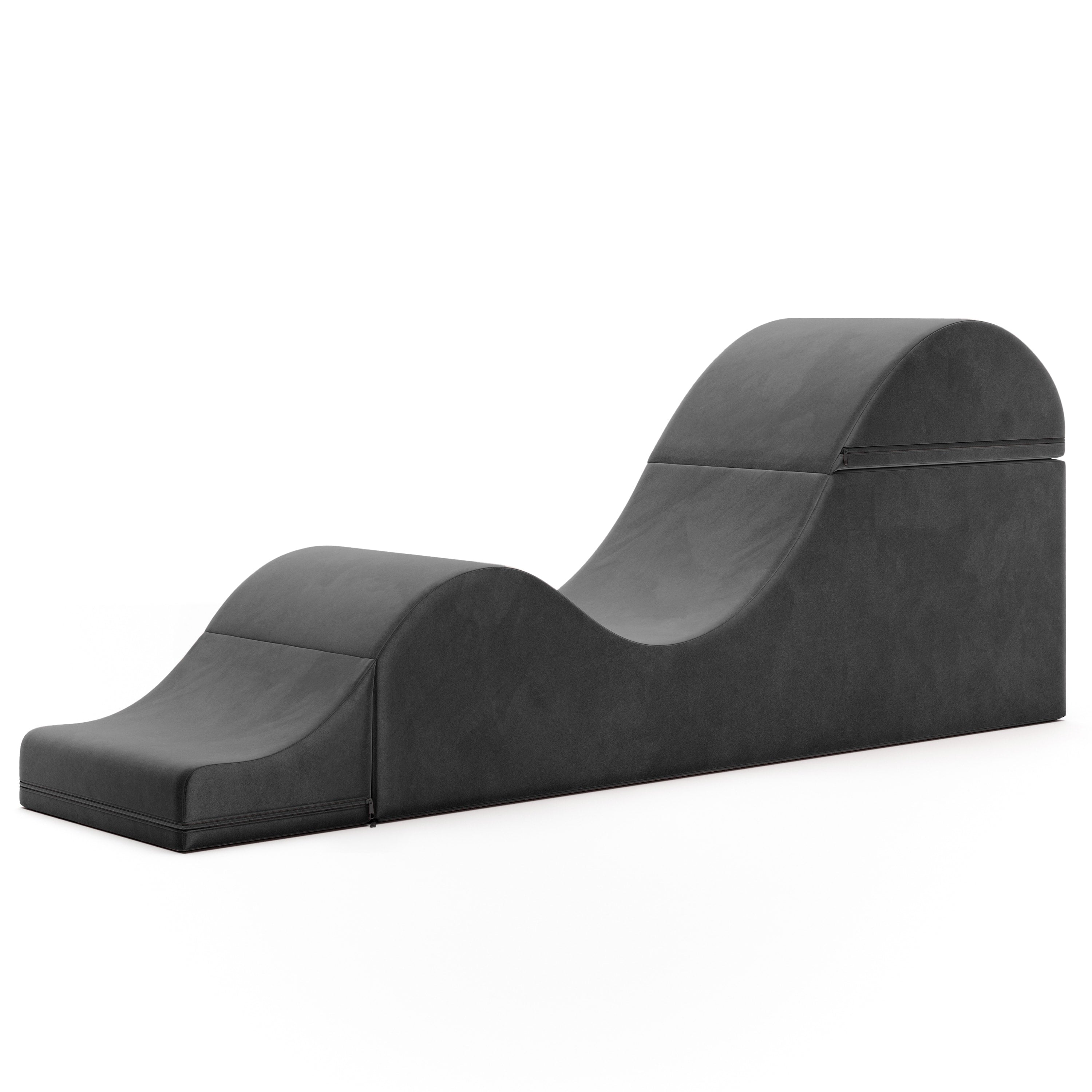 Black velvet convertible sex chair and bed bench with undulating curves.