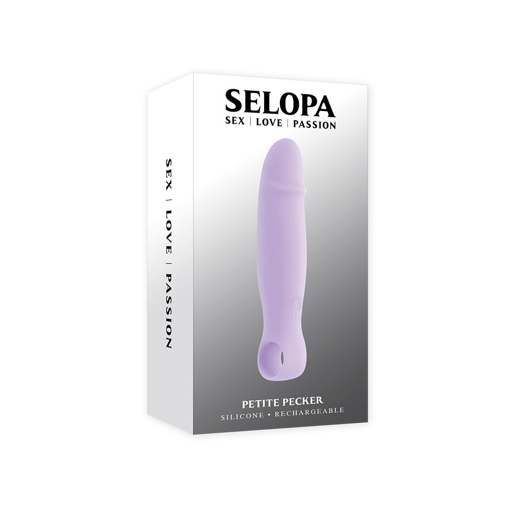A purple silicone vibrator with a ringed base on a white box.