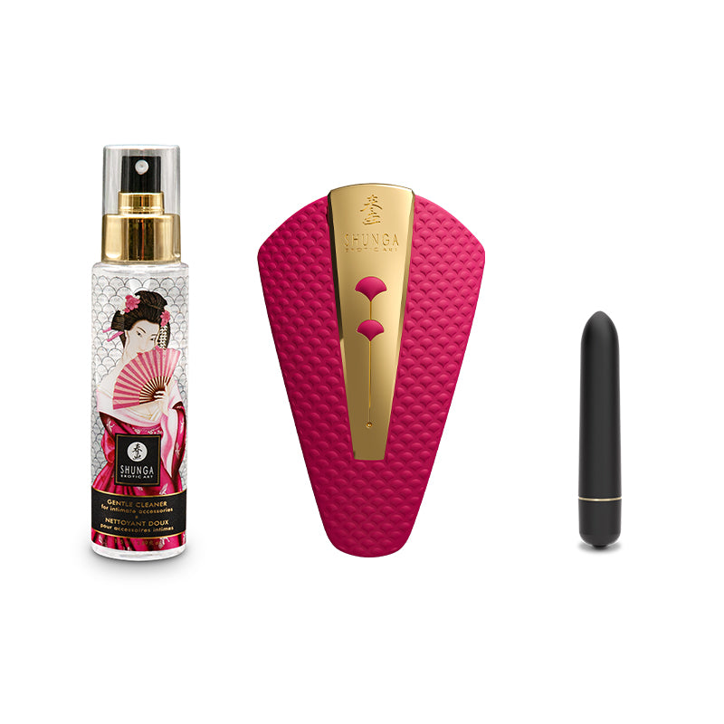 A bottle of cleaner, a pink and gold vibrator, and a black vibrator.