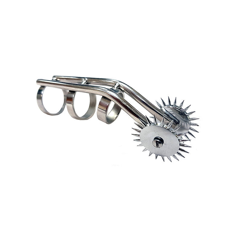 Stainless steel sensation toy with three finger rings and two spiked pinwheels.
