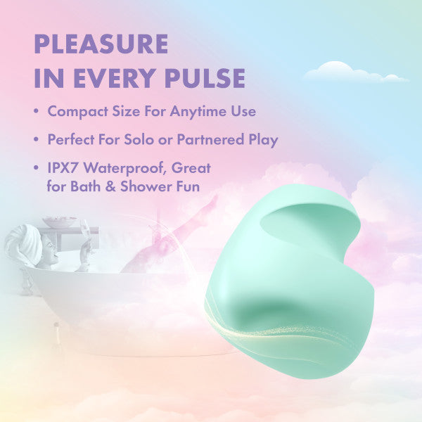 A mint green, curved vibrator with a smooth finish, shown with a woman in a bathtub.