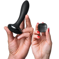 Black remote-controlled prostate vibrator with a flexible base.