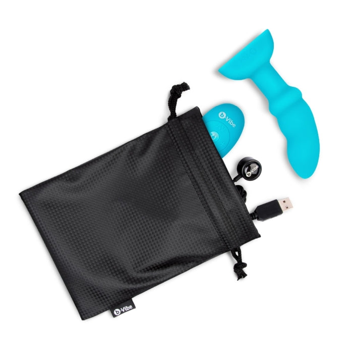 A blue silicone remote-controlled prostate toy with a charging cable and storage bag.