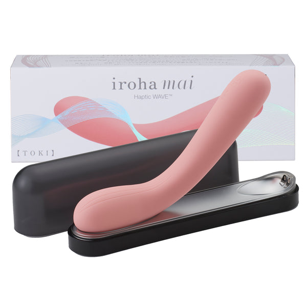 Pink silicone vibrator with charging base and box.