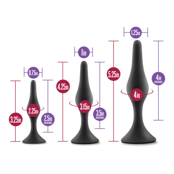 Three black silicone anal plugs of varying sizes with measurement labels.