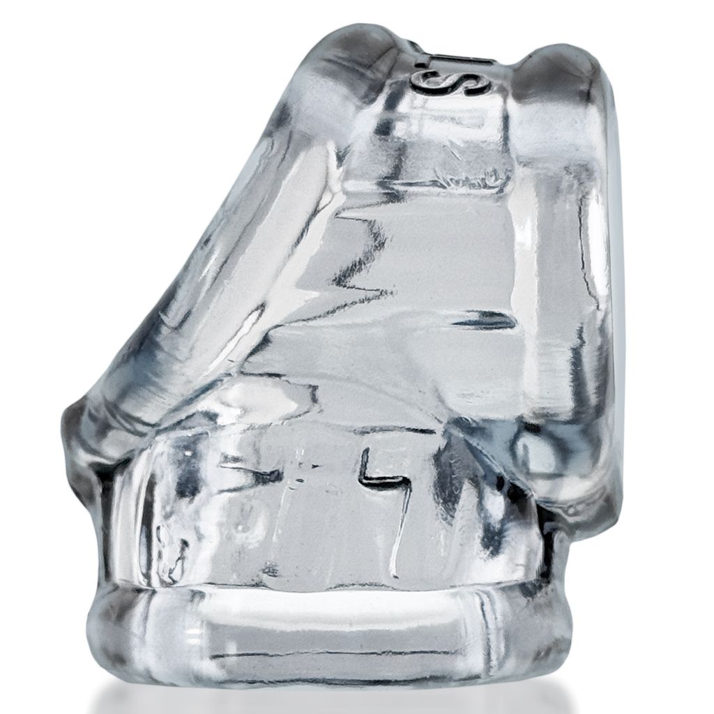 Clear cock ring and ball stretcher with visible markings.