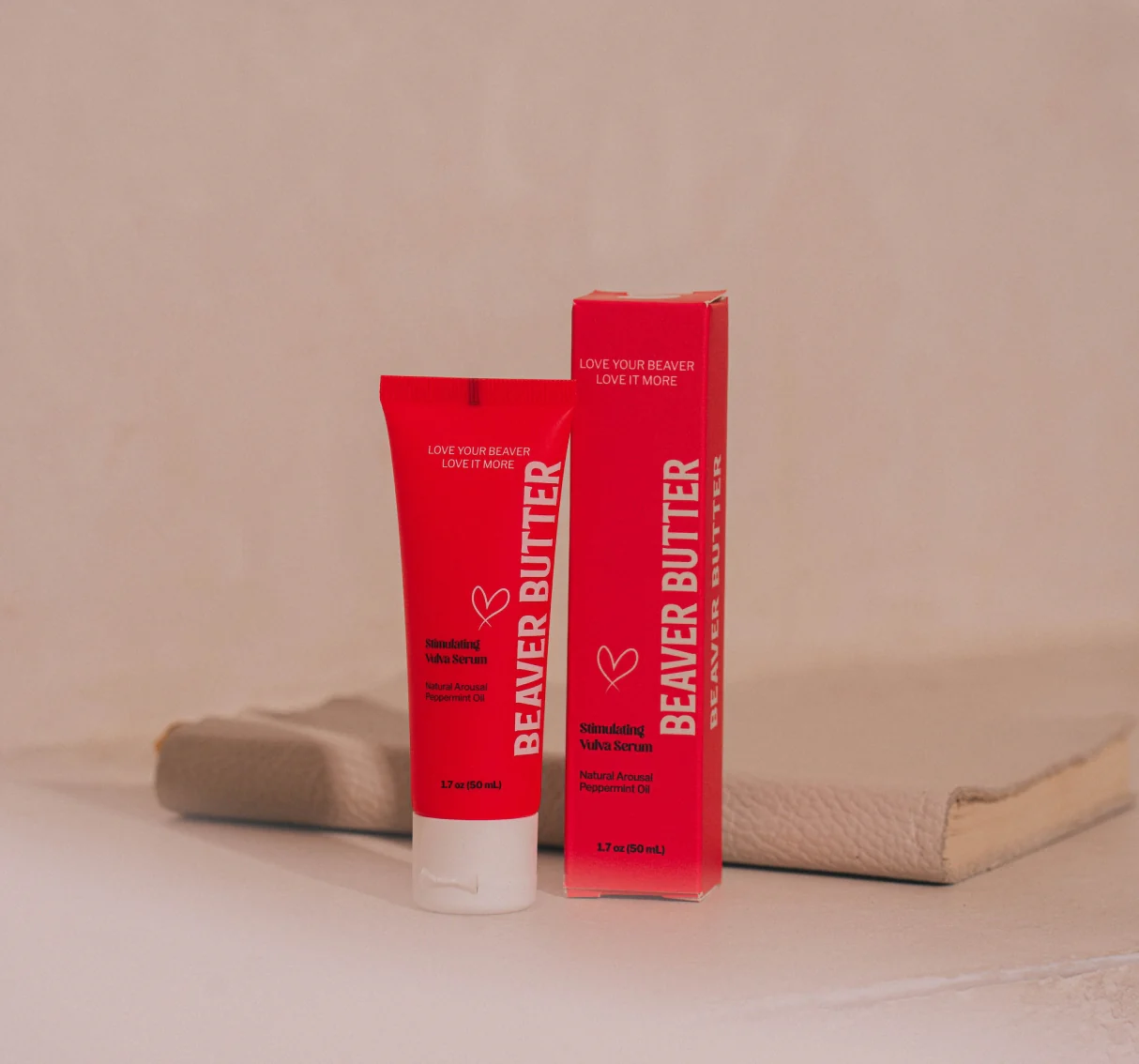 Red tube and box of Beaver Butter Stimulating Vulva Serum.