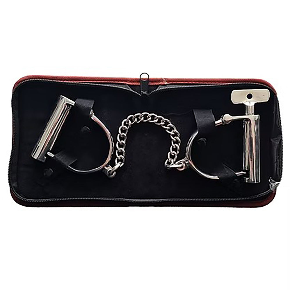 Stainless steel wrist shackles with a chain and key in a red case.