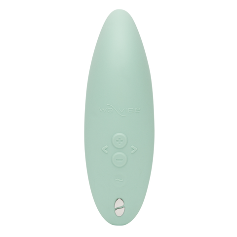 A sage green We-Vibe Melt 2 clitoral stimulator with control buttons.
