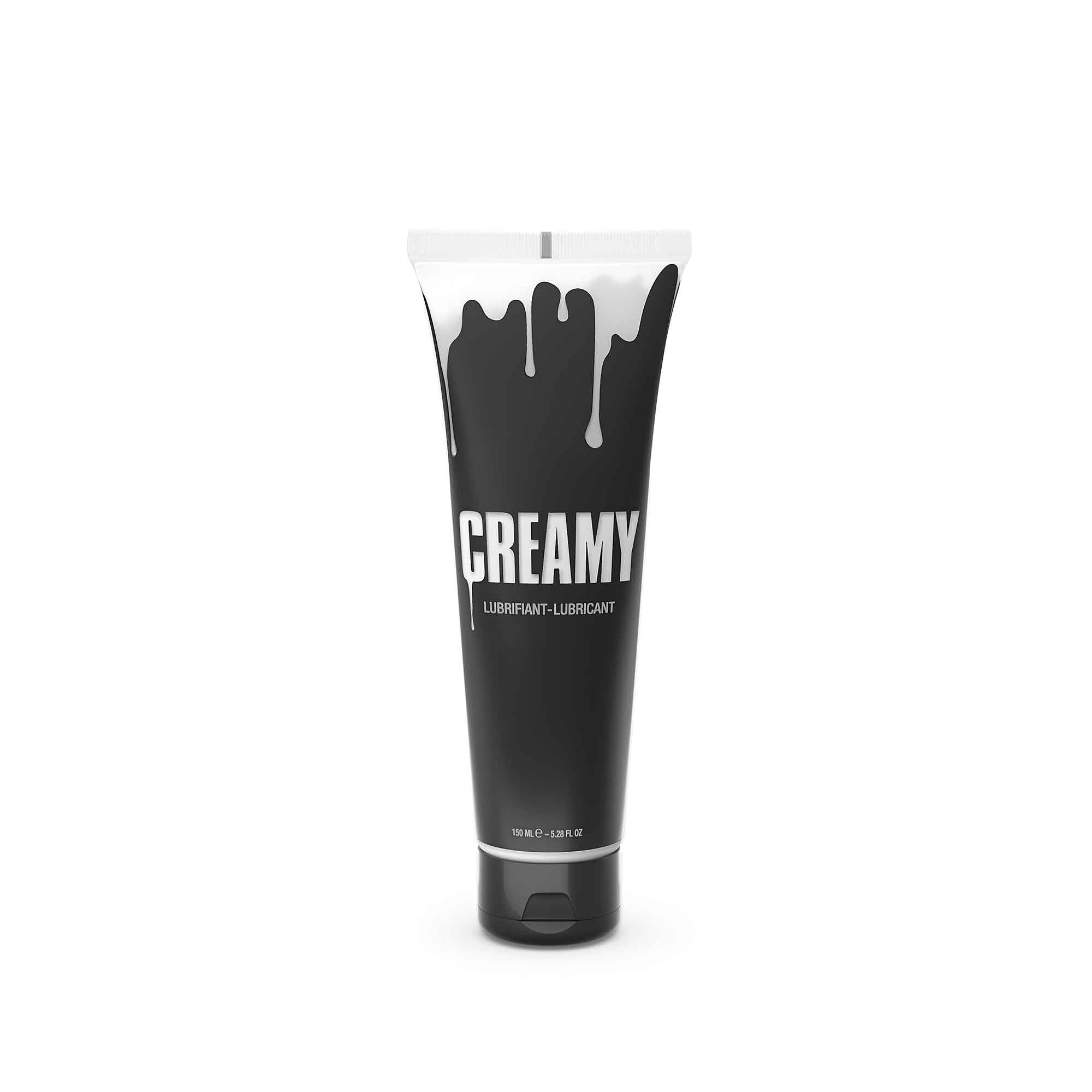 A black tube of "Creamy" lubricant with white dripping paint design.