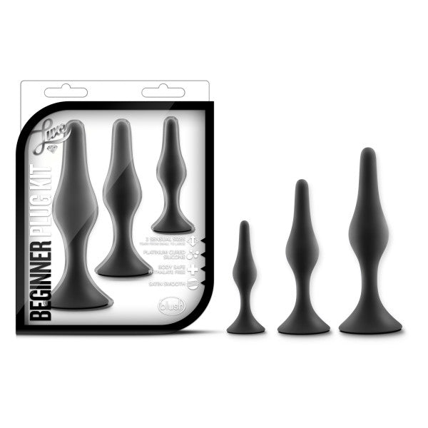 Black silicone anal plug kit with three graduated sizes.