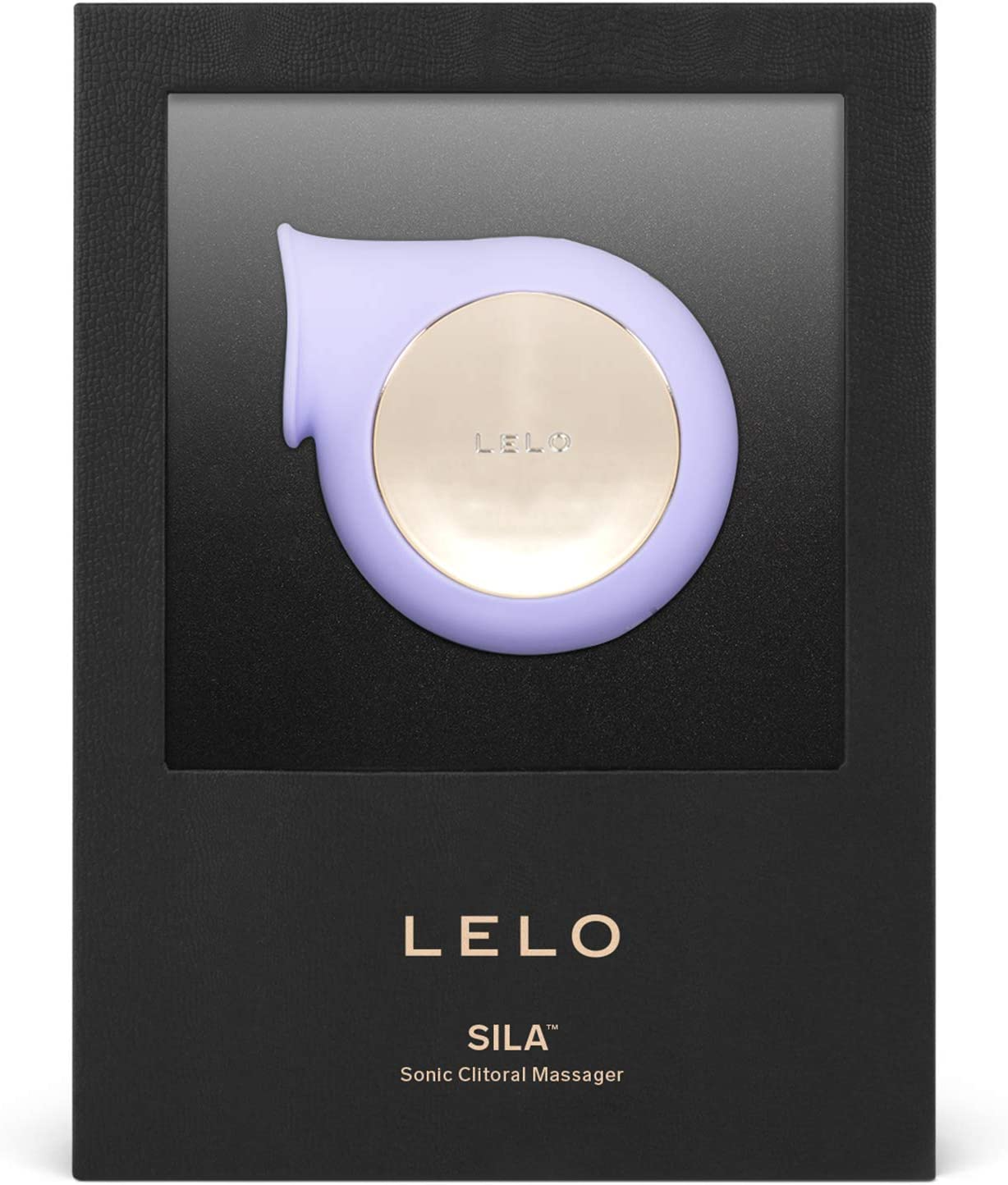 A lilac Lelo Sila sonic clitoral massager in its packaging.