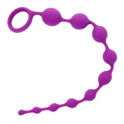 Purple beaded silicone anal string with a retrieval ring.