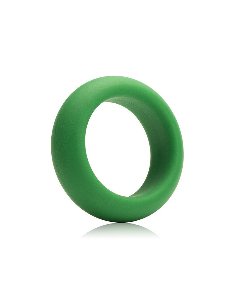 A green silicone cock ring with a medium stretch.
