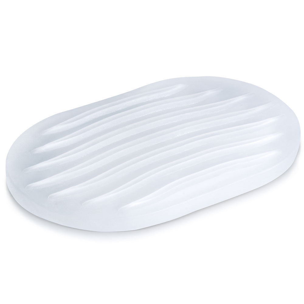 White oval textured stroker pad with wavy ridges.