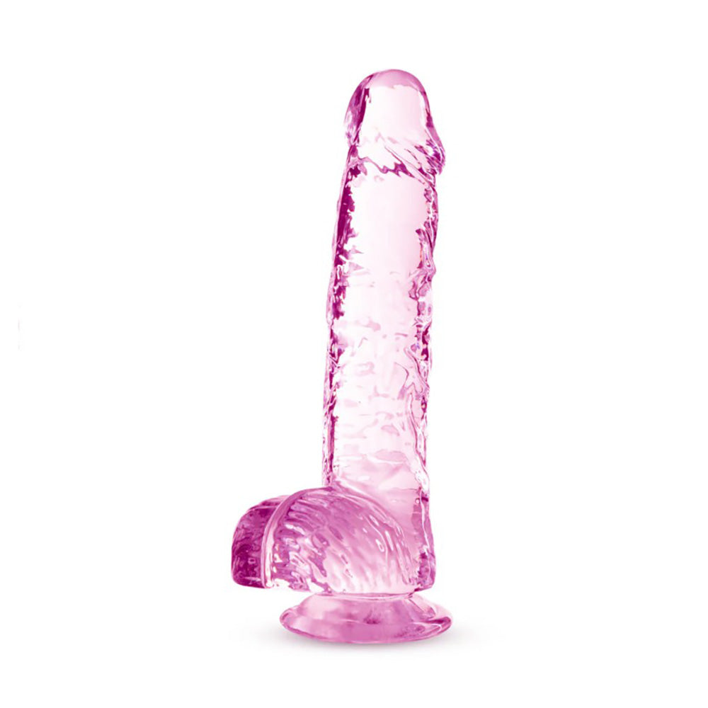 A 6-inch rose blush crystalline TPE dildo with suction cup base.