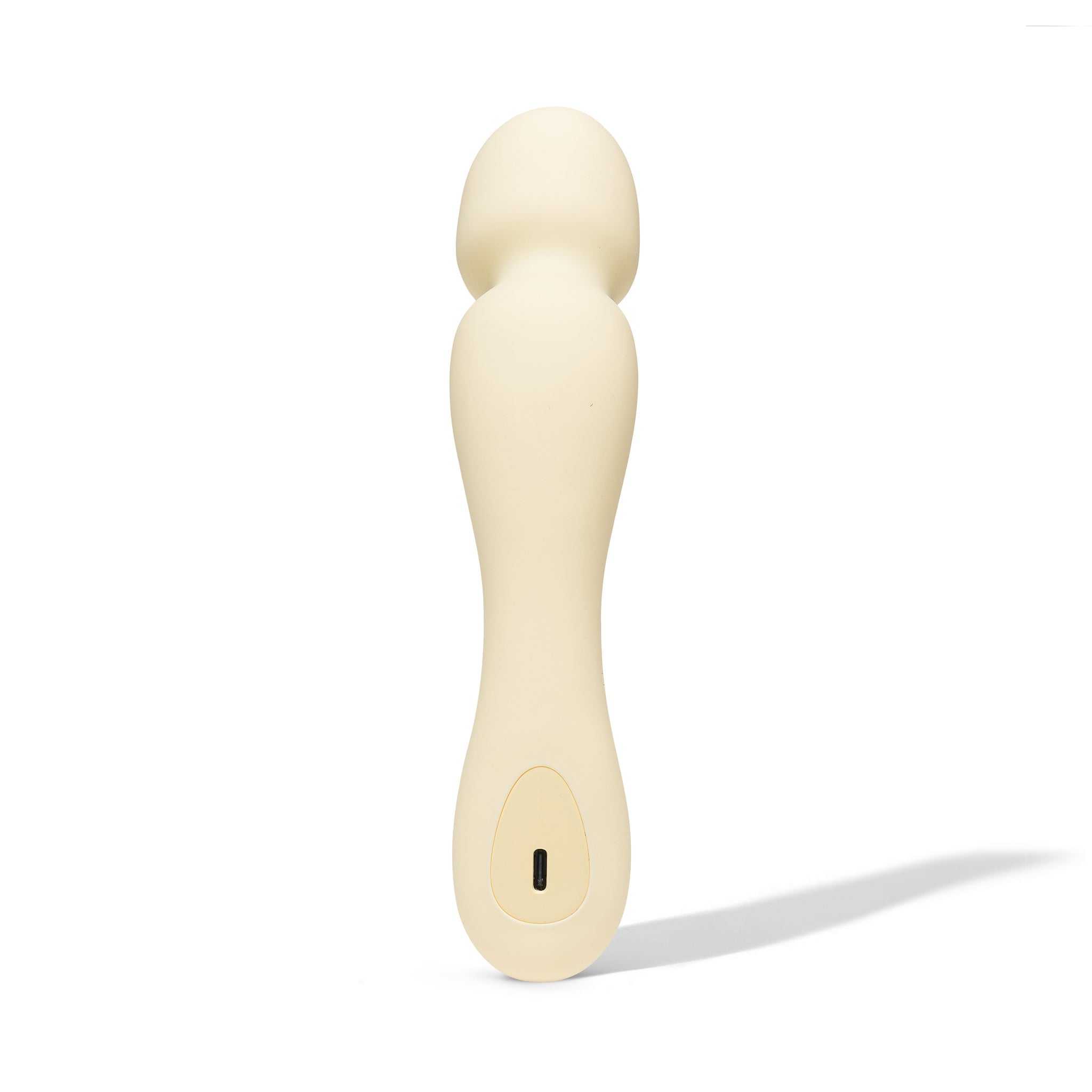 A cream-colored mini wand vibrator with a USB-C charging port.
