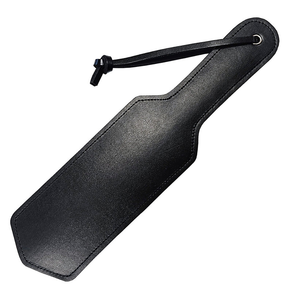 Black leather paddle with a wrist strap.