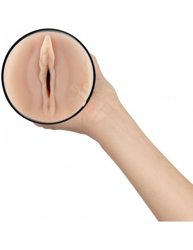 Lauren Phillips TPE masturbator sleeve held in a hand.