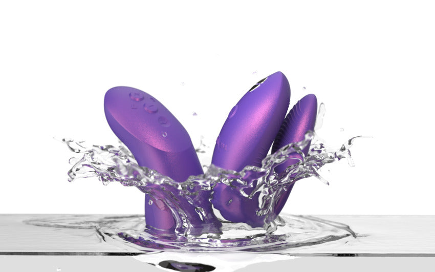 Purple couples vibrator with water splash.