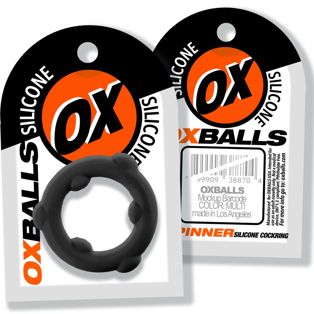 Spinner silicone cock ring with nubs on a white card.
