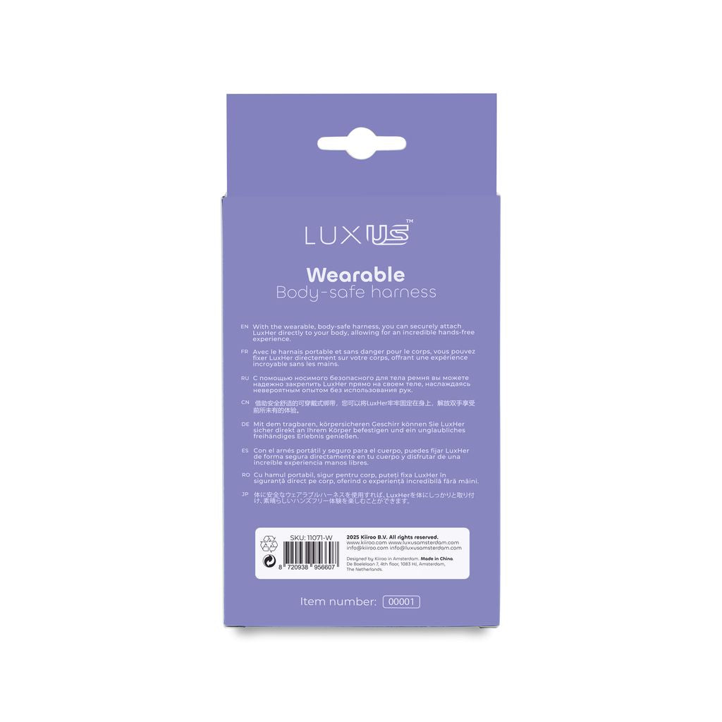Luxus wearable body-safe harness with multilingual instructions.