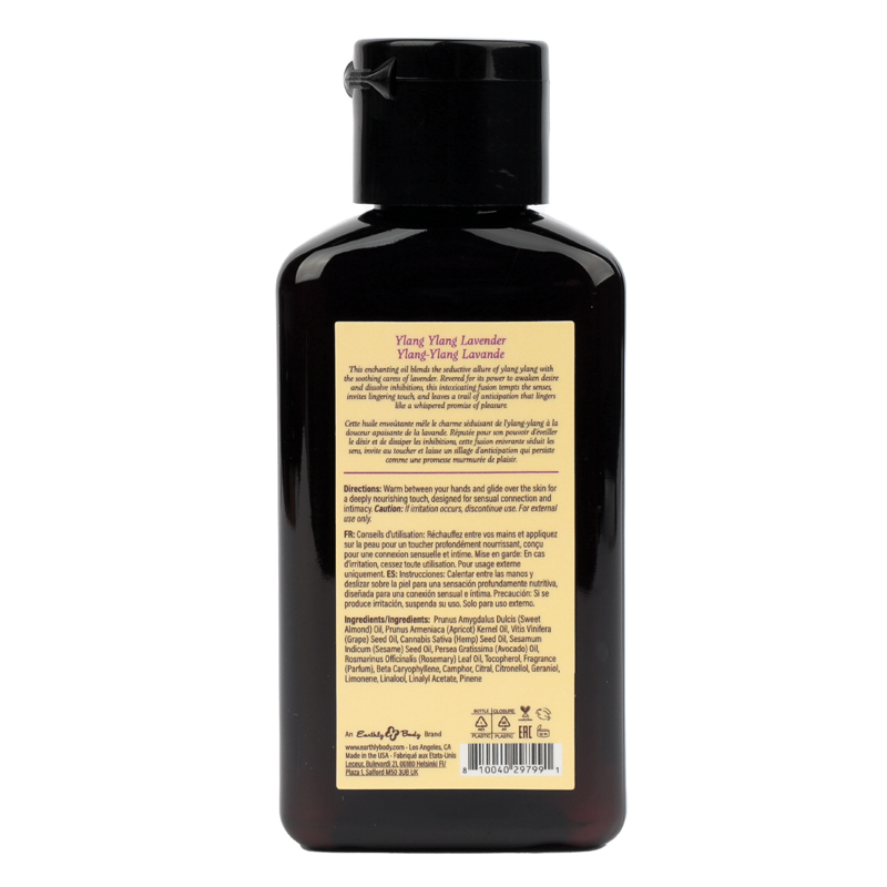 Ylang Ylang Lavender massage oil in a dark bottle with a yellow label.