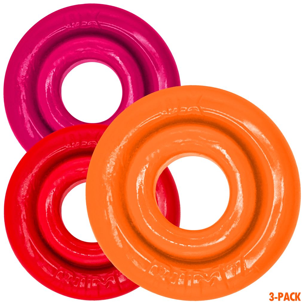 Three colorful cock rings in pink, red, and orange.