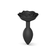 Black silicone anal plug shaped like an open rose with a tapered base.