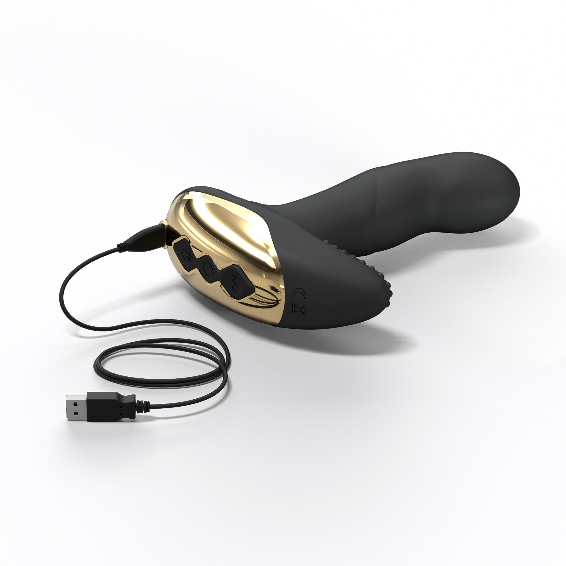 Black and gold vibrator with USB charging cable.