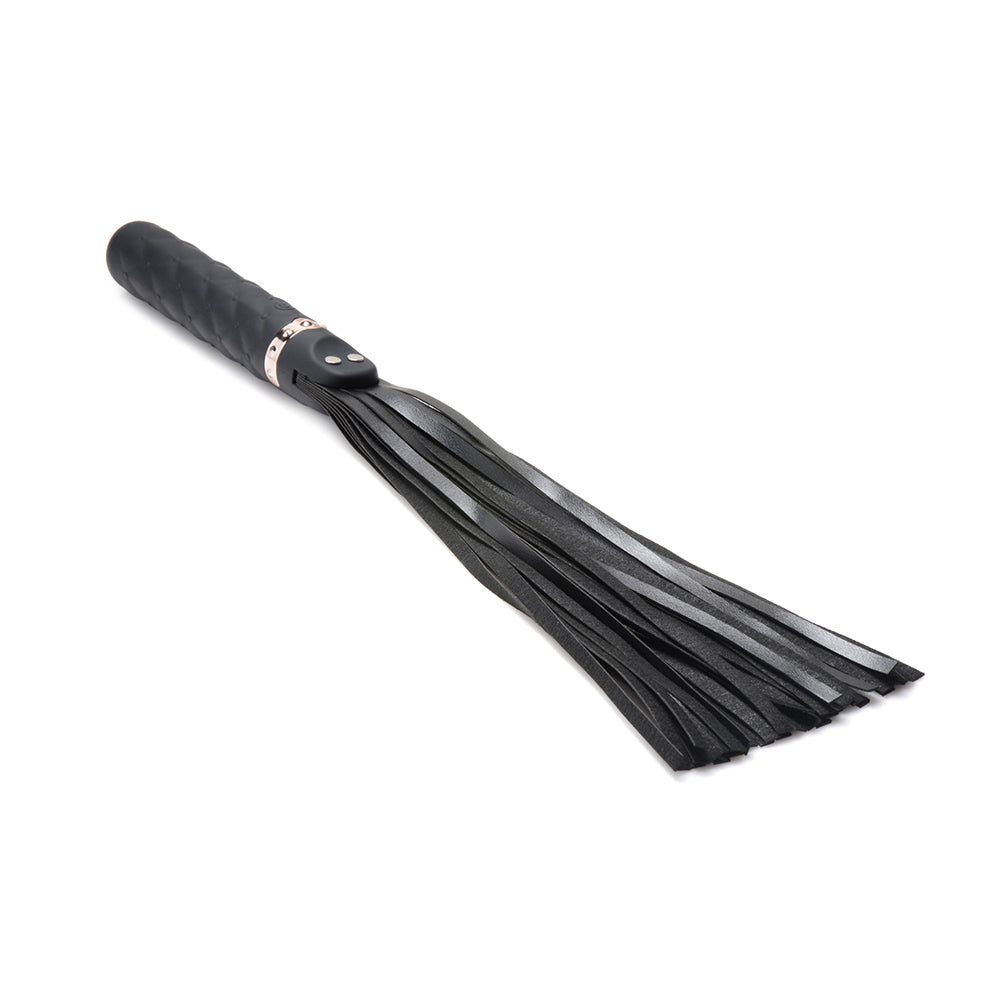 Black silicone dildo flogger with textured handle and leather-like lashes.
