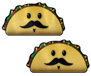 Two kawaii taco nipple pasties with mustaches.