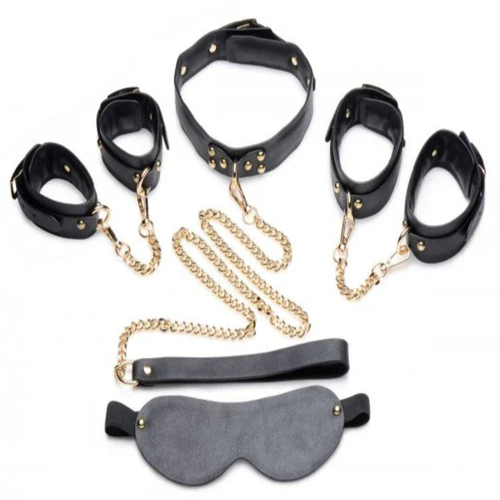 Black leather bondage kit with gold chains, including cuffs, collar, and blindfold.