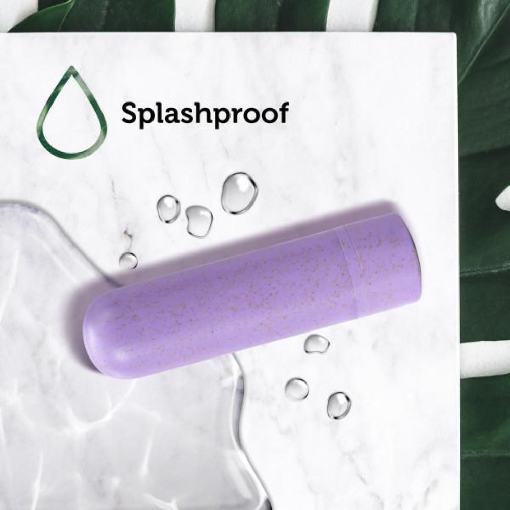 Lilac splashproof rechargeable bullet vibrator with water droplets.