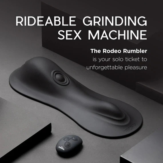 A black Rodeo Rumbler clitoral tapper with a remote control.