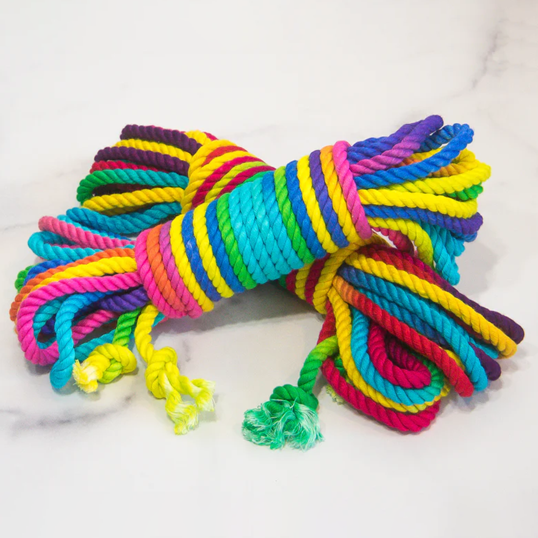 Rainbow bamboo silk bondage rope with vibrant colors.