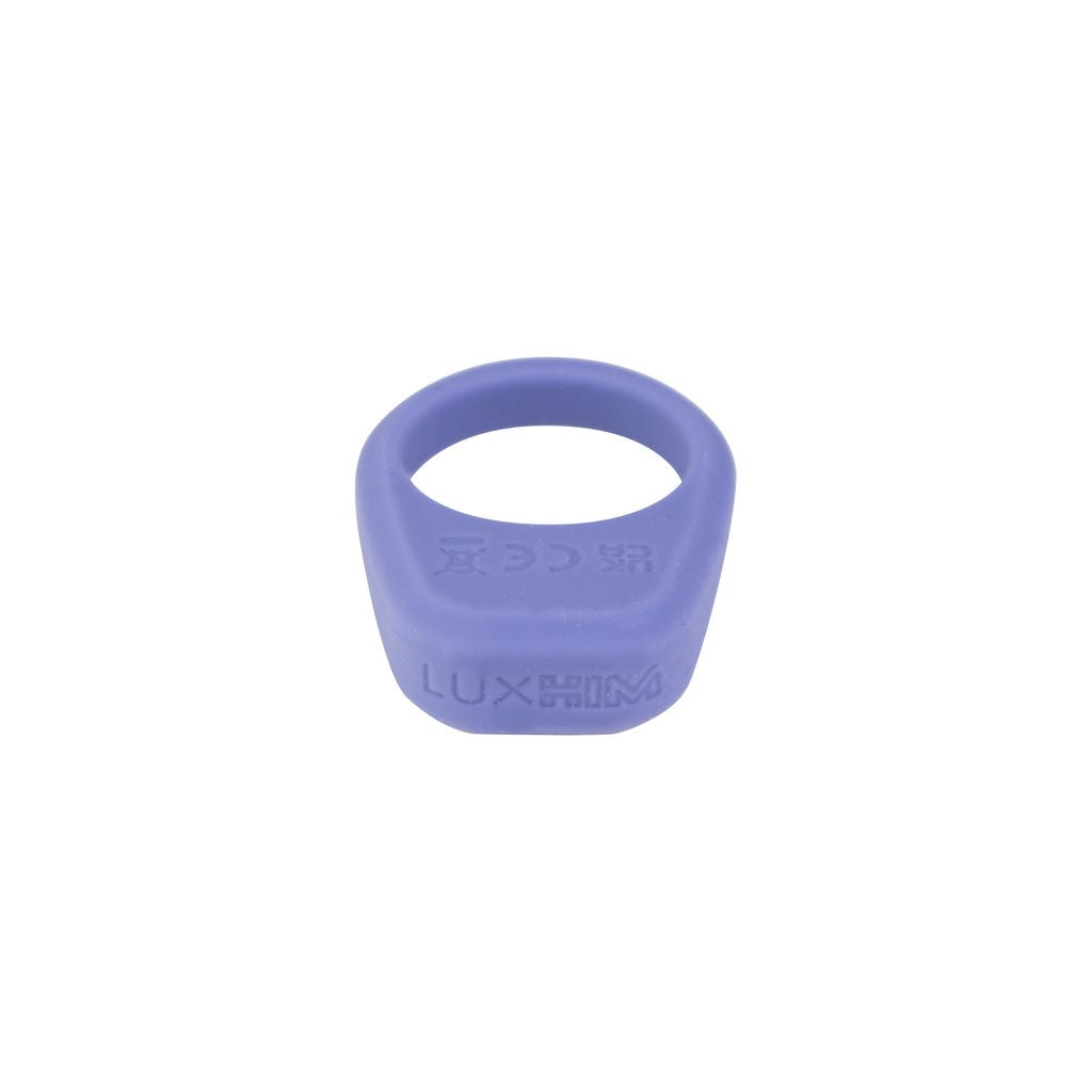 A purple silicone ring with "LUXUS" and "UK CE" embossed on it.