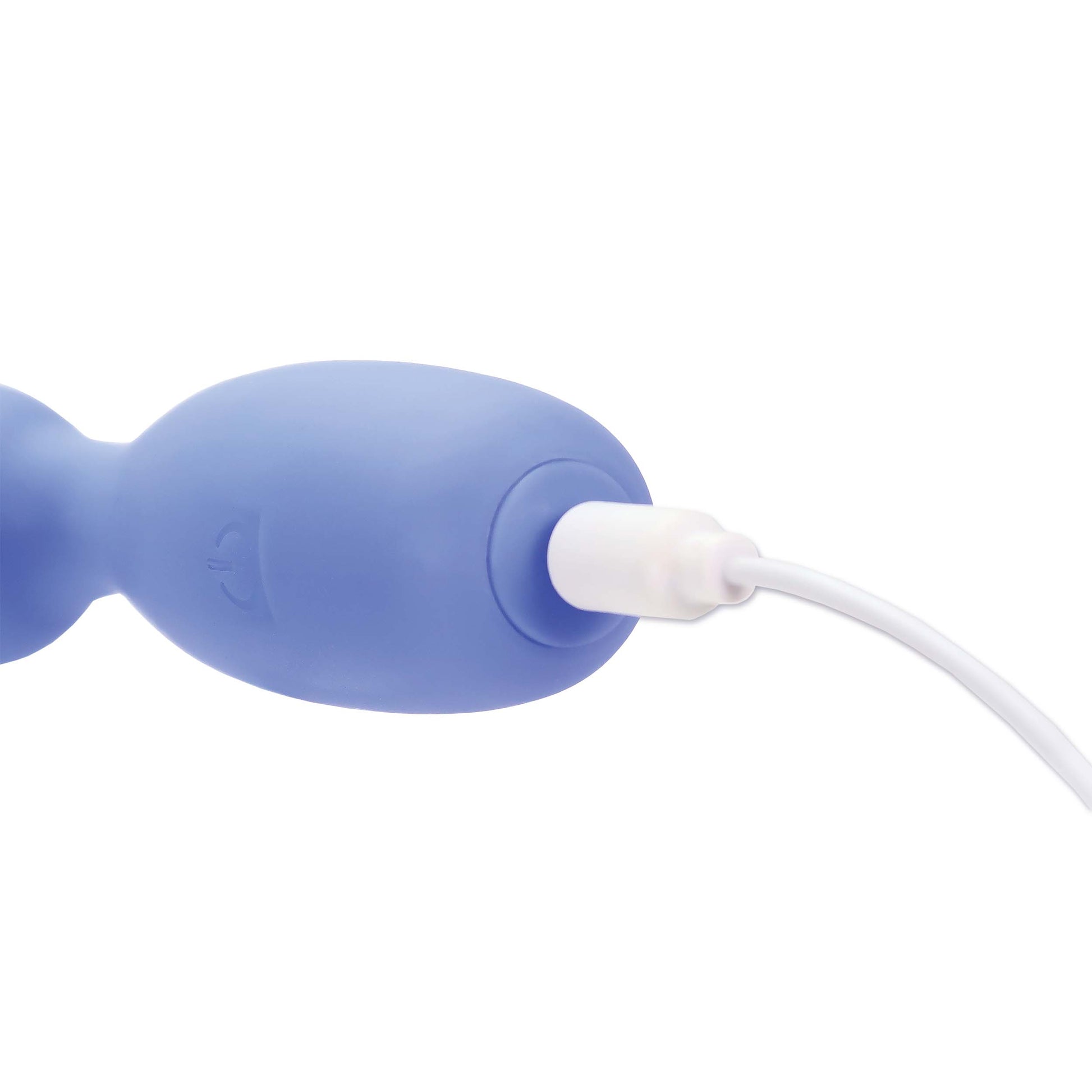 A blue vibrating personal massager with a white charging cable.