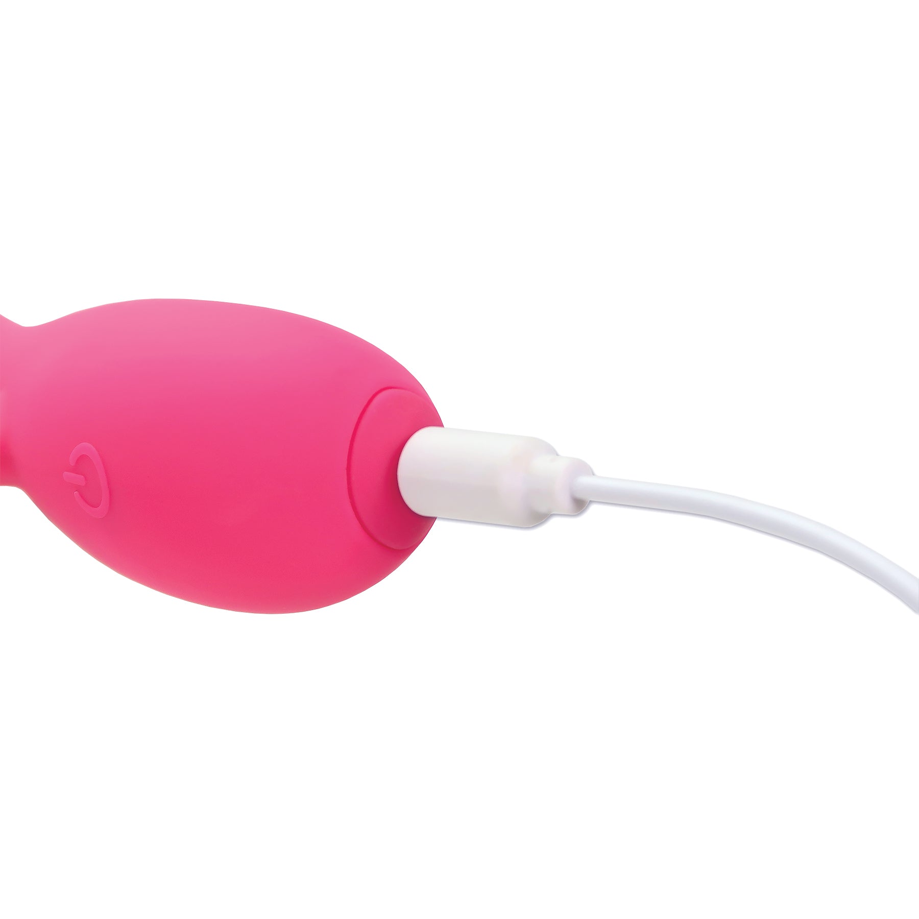 Pink vibrating massager with a white charging cable plugged in.