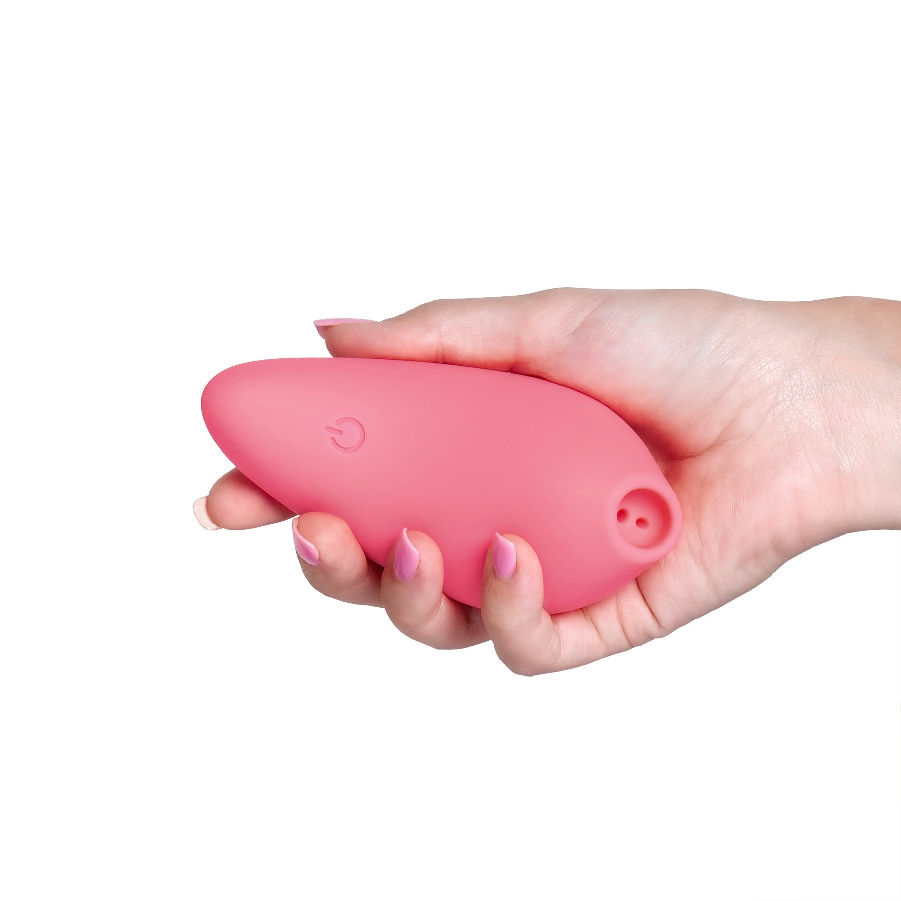 A pink air pulsing clitoral arouser held in a hand.