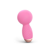 Pink mini silicone massager with a power button symbol.