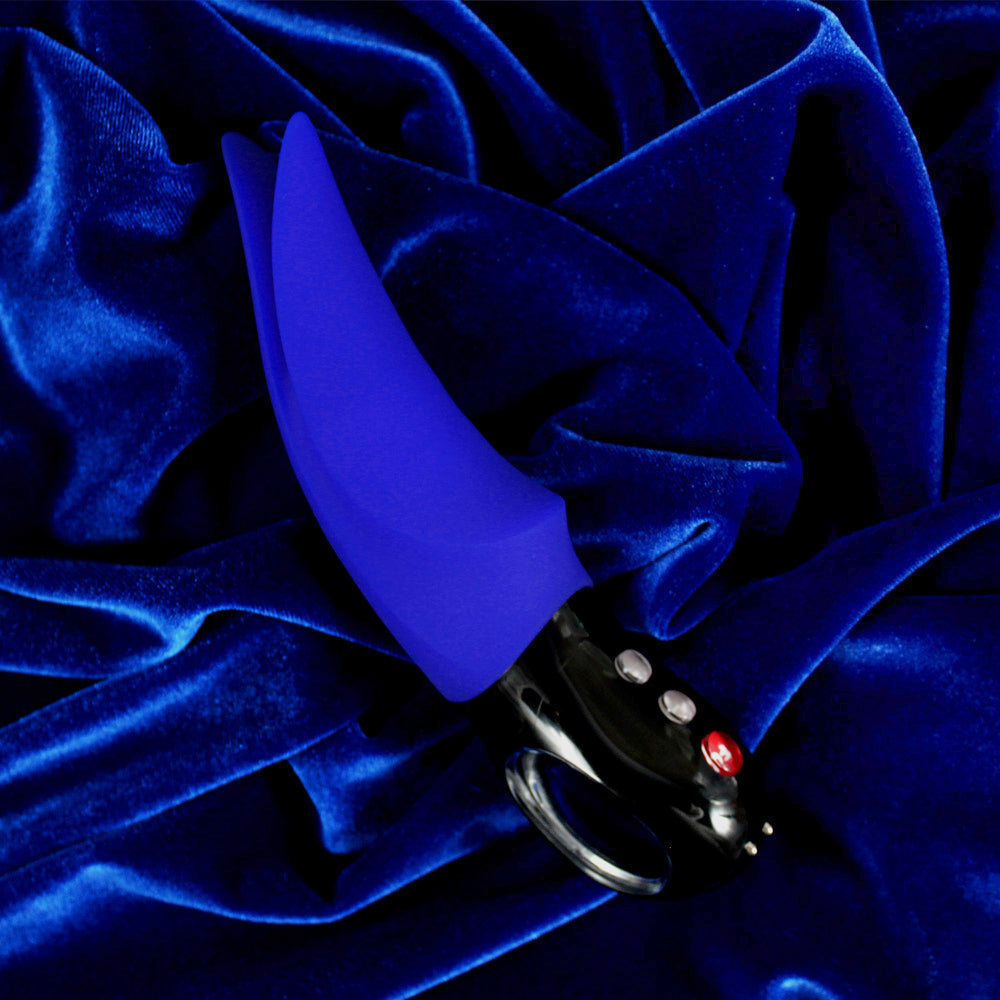 Sapphire Volta Jewel clitoral vibrator with loop handle.