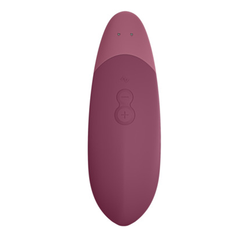 A dusky pink clitoral vibrator with two buttons and two small dots at the top.