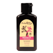 Earthly Body Wild Pink Rose massage oil in a dark bottle with a yellow label.