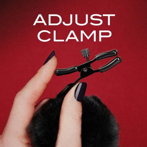 Adjustable black nipple clamps with faux fur pom poms.